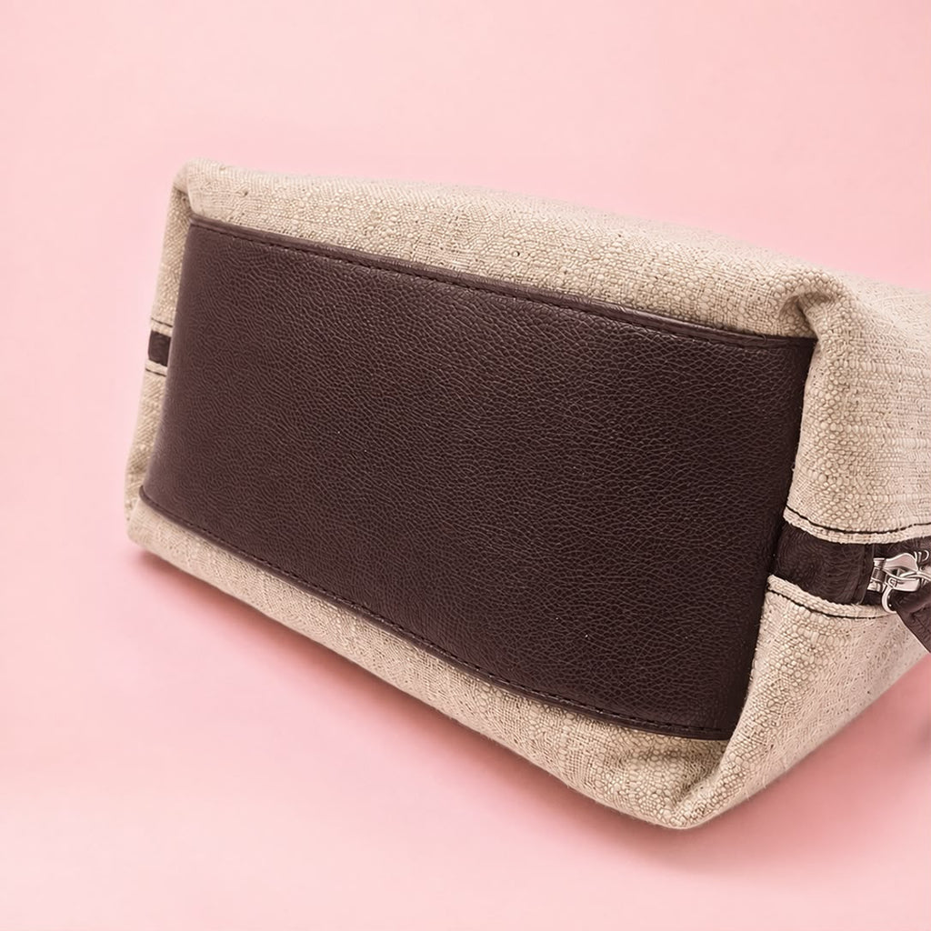 Leather bottom panel detail on TOGGO Goods linen tote bag