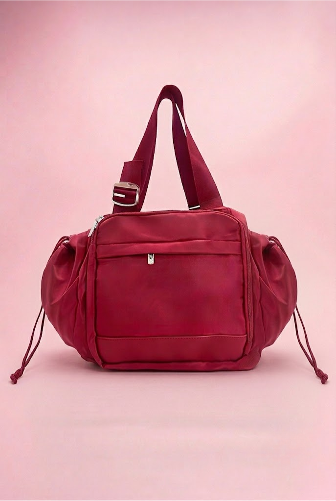 TOGGO Voyager V1 crossbody bag in Magenta
